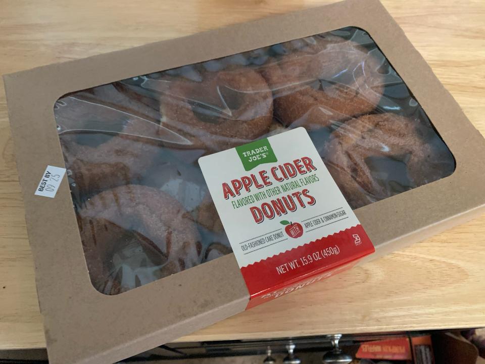 a box of trader joes apple cider donuts