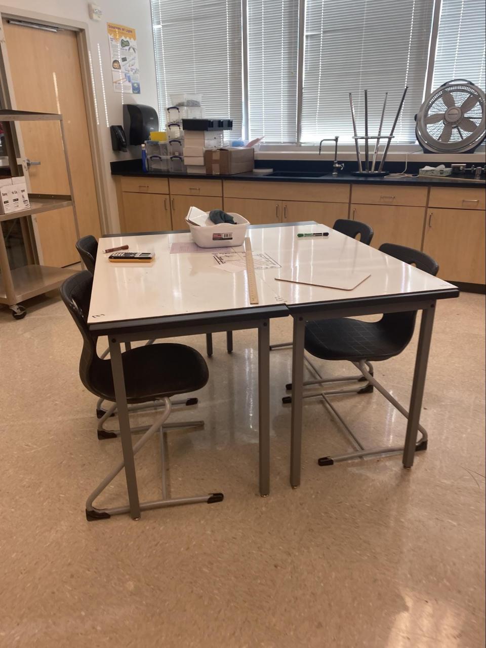 Eliana Smith says the table in physics class at Cedar Ridge High School in Round Rock, Texas,  is normally filled with students.