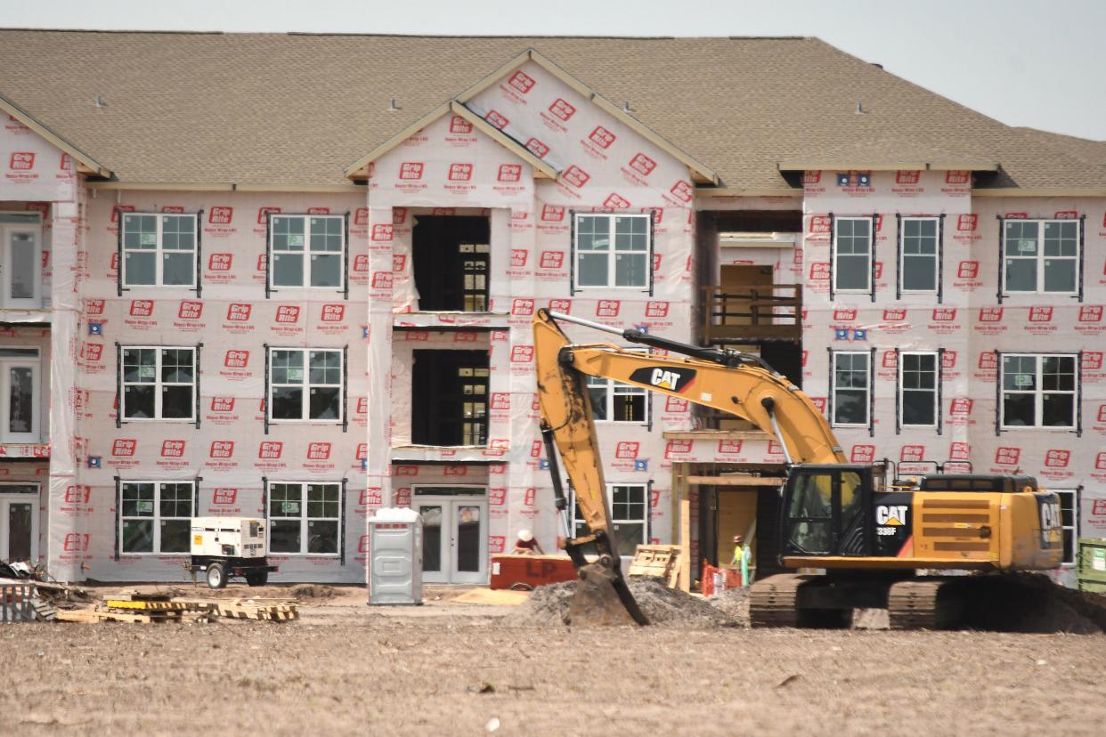 Construction continues along Market Street in Wilmington, from apartments to roadwork.