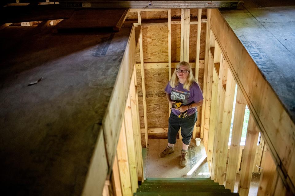 Amy Cantrell inside one of BeLoved Asheville’s tiny homes July 13, 2023.