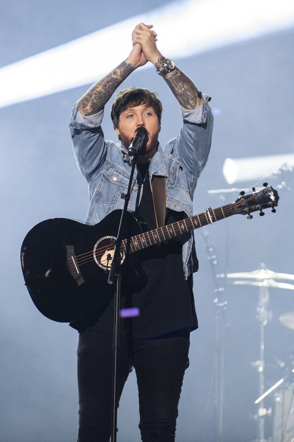 James Arthur, performs for 20,000 students and teachers at WE Day Toronto at the Scotiabank Arena on Thursday, Sept. 19, 2019, in Toronto. (Photo by Arthur Mola/Invision for WE Day/AP Images)