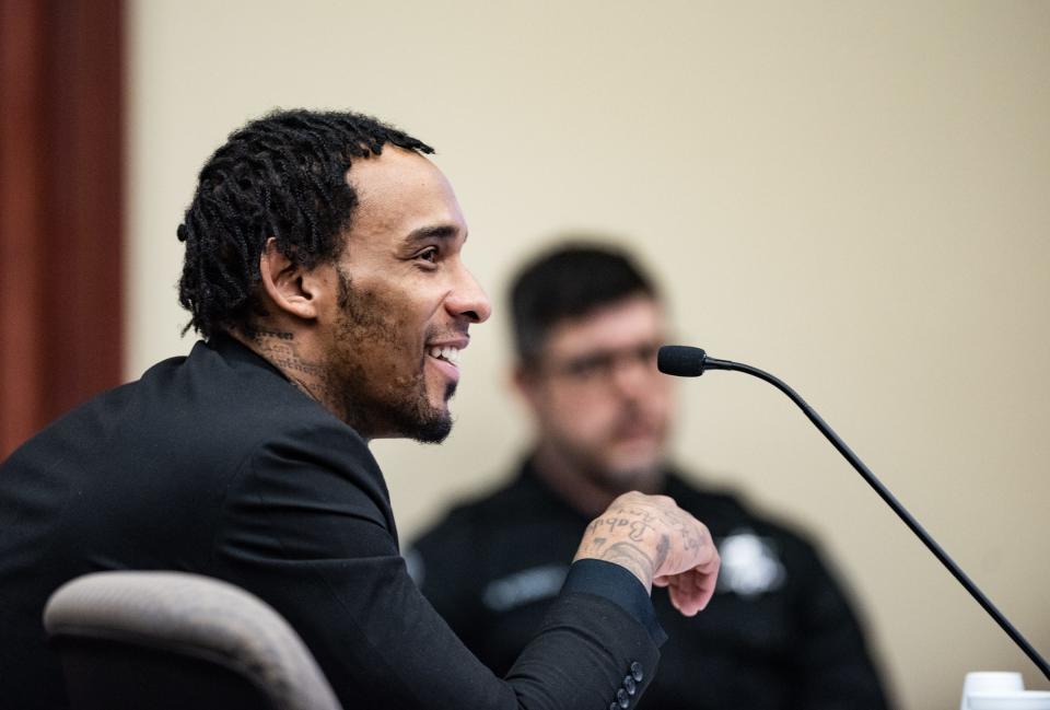 Anthony Anderson, Jr., 29, smiles Thursday, April 18, 2024, during his murder and assault trial in Ingham County Circuit Judge James Jamo's courtroom at Veteran's Memorial Courthouse in Lansing. Anderson is on trial for the Dec. 31, 2022 killing of Curshawn "Kaz" Terrell at 51 Sessions recording studio.