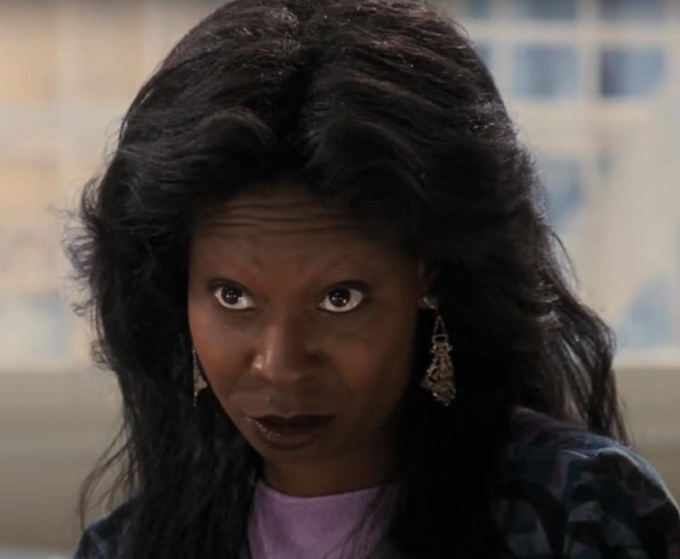 Whoopi Goldberg as Oda Mae Brown warns Molly that she's in danger in "Ghost"