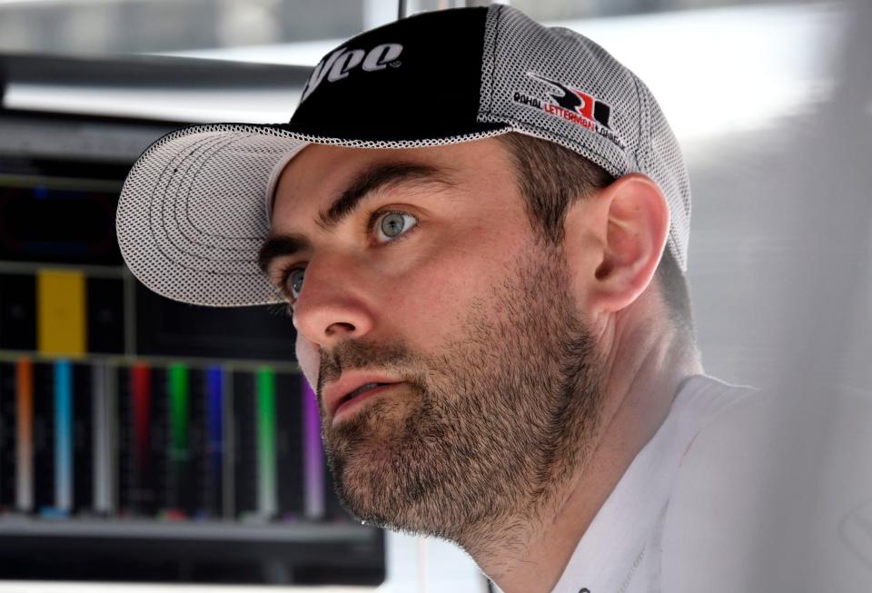 Rahal Letterman Lanigan Racing driver Jack Harvey (45) sits in his pit box Thursday, May 19, 2022, during the third day of Indianapolis 500 practice at Indianapolis Motor Speedway. 