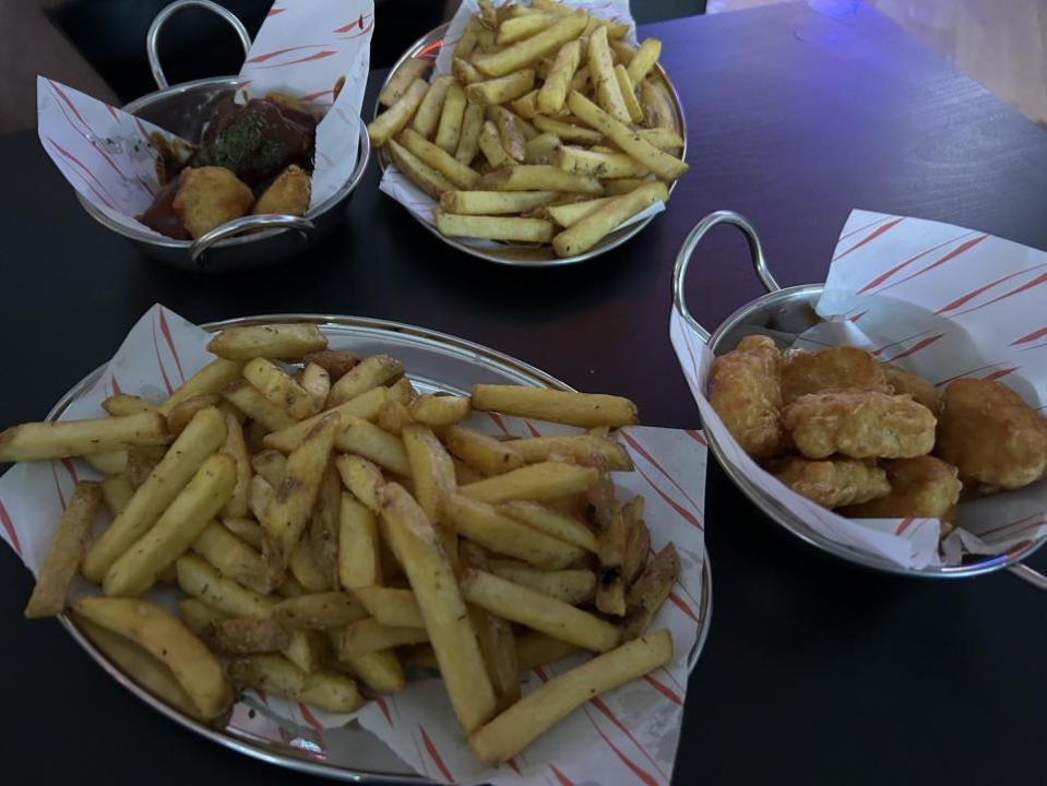 Gazette: Delicious - two portions of fries and nuggets from the No Name Bar