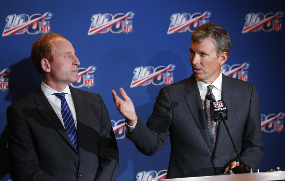 Dr. Allen Sills, right, the NFL's chief medical officer, speaks as Jeff Miller, the league's executive vice president of health and safety initiatives, looks on during a news conference at the NFL Fall League Meeting, Tuesday, Oct. 15, 2019 in Fort Lauderdale, Fla. The NFL says the number of concussions in exhibition games this year rose to 49 from 34 in 2018, an increase of 44 percent and a setback in efforts to reduce brain trauma. (AP Photo/Wilfredo Lee)