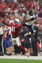 <p>Dede Westbrook #12 of the Jacksonville Jaguars is unable to complete the pass against Antoine Bethea #41 of the Arizona Cardinals in the first half at University of Phoenix Stadium on November 26, 2017 in Glendale, Arizona. (Photo by Christian Petersen </p>