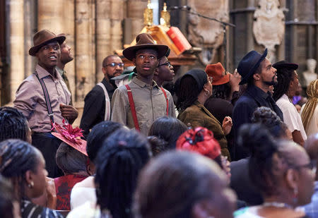 Performers from the HEbE Foundation charity perform during a Service of Thanksgiving to mark the 70th anniversary of the landing of the Windrush, at Westminster Abbey, London, Britain, June 22, 2018. Niklas Halle'n/Pool via REUTERS