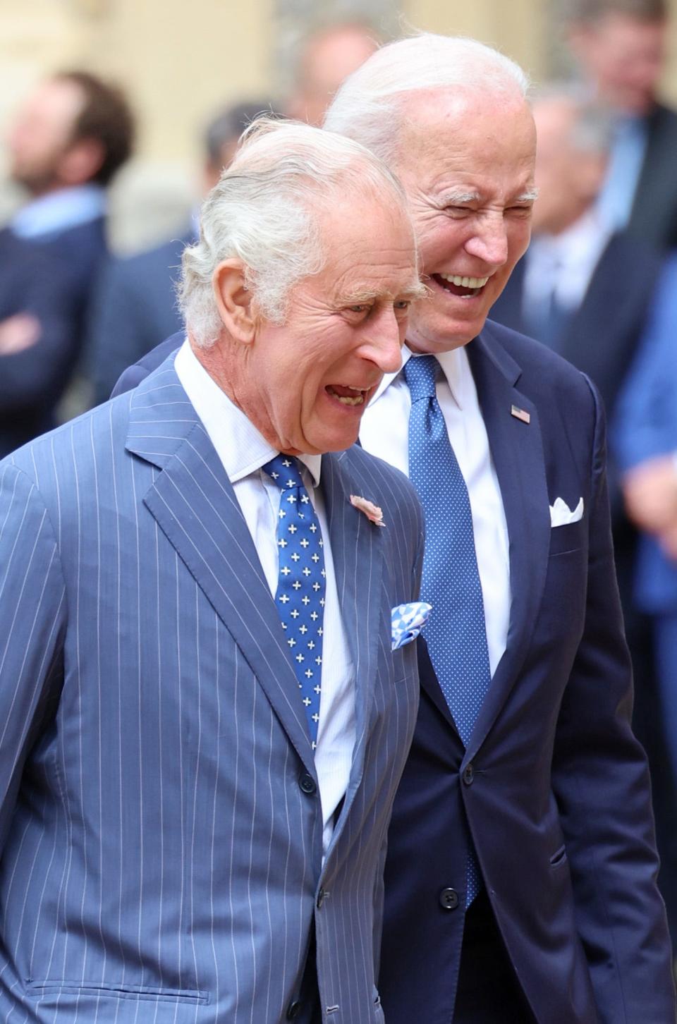 King Charles and Joe Biden laugh during their meeting at Windsor Castle in 2023.