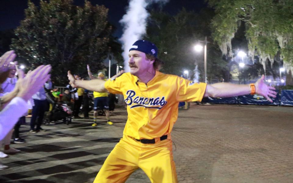 Eric Byrnes celebrates with fans and the Banana Nanas after being introduced as the head coach for the Banana Ball World Tour Tuesday night at Grayson Stadium.