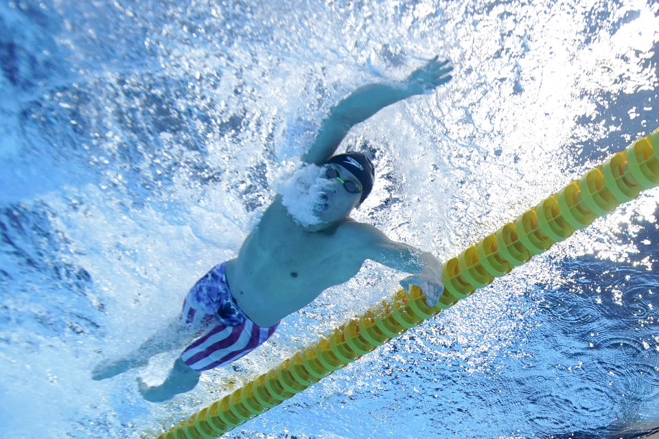 Robert Finke, of the United States, swims win the gold medal in the men's 1500-meter freestyle final at the 2020 Summer Olympics, Sunday, Aug. 1, 2021, in Tokyo, Japan. (AP Photo/Jeff Roberson)