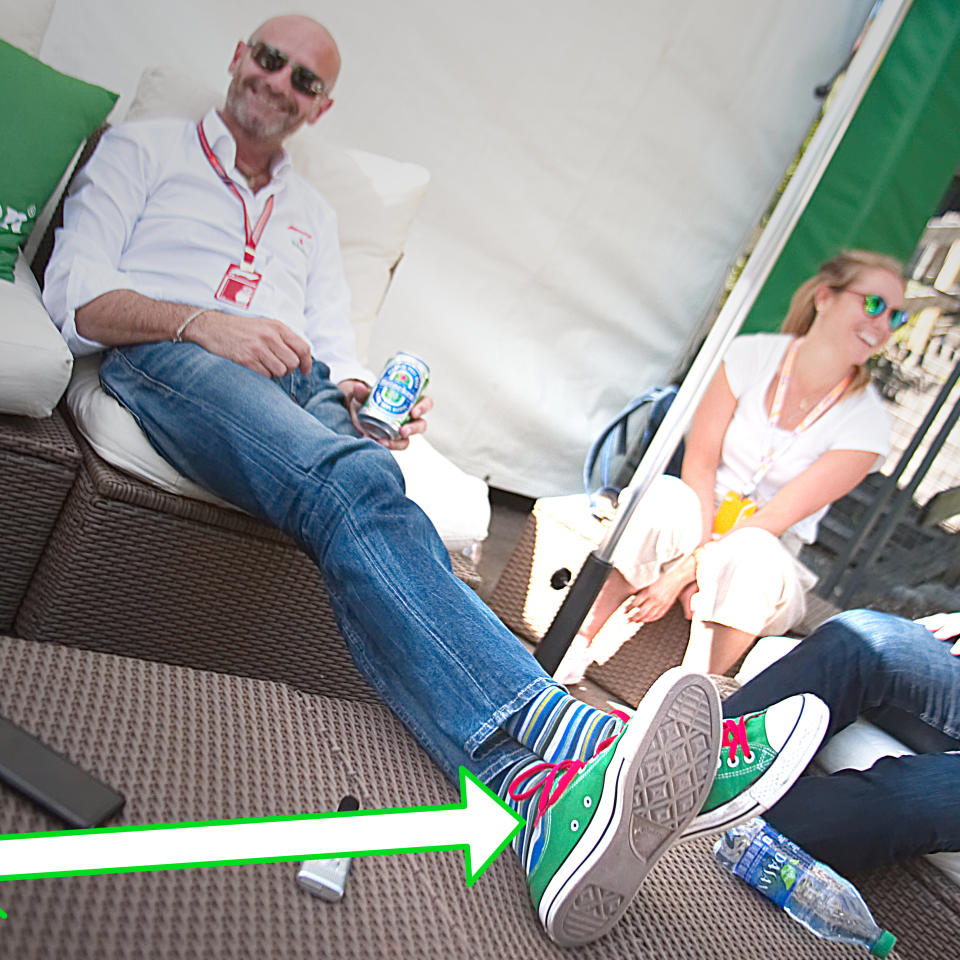 Shoehorning the brand in: Heineken global brand chief Gianluca Di Tondo and his corporate-coloured footwear