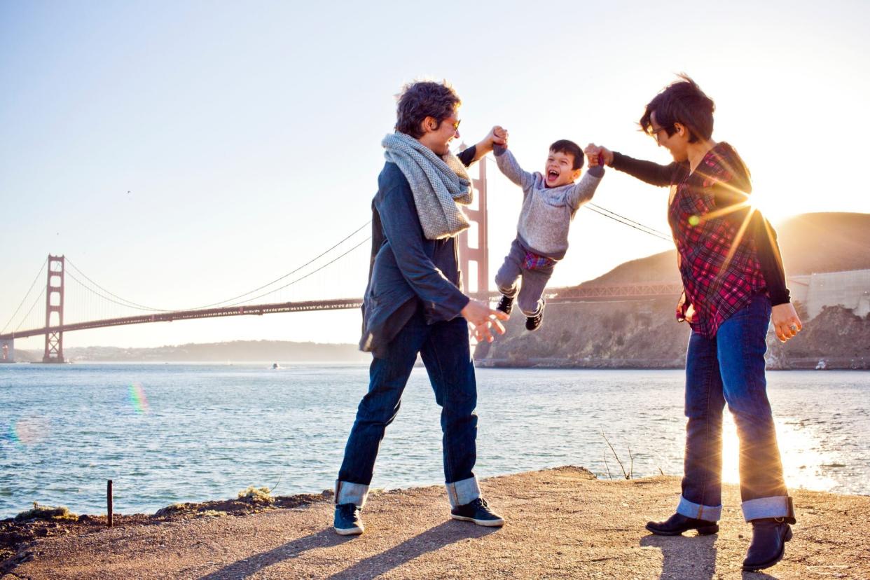 happy family in front of Golden Gate Bridge, San Francisco