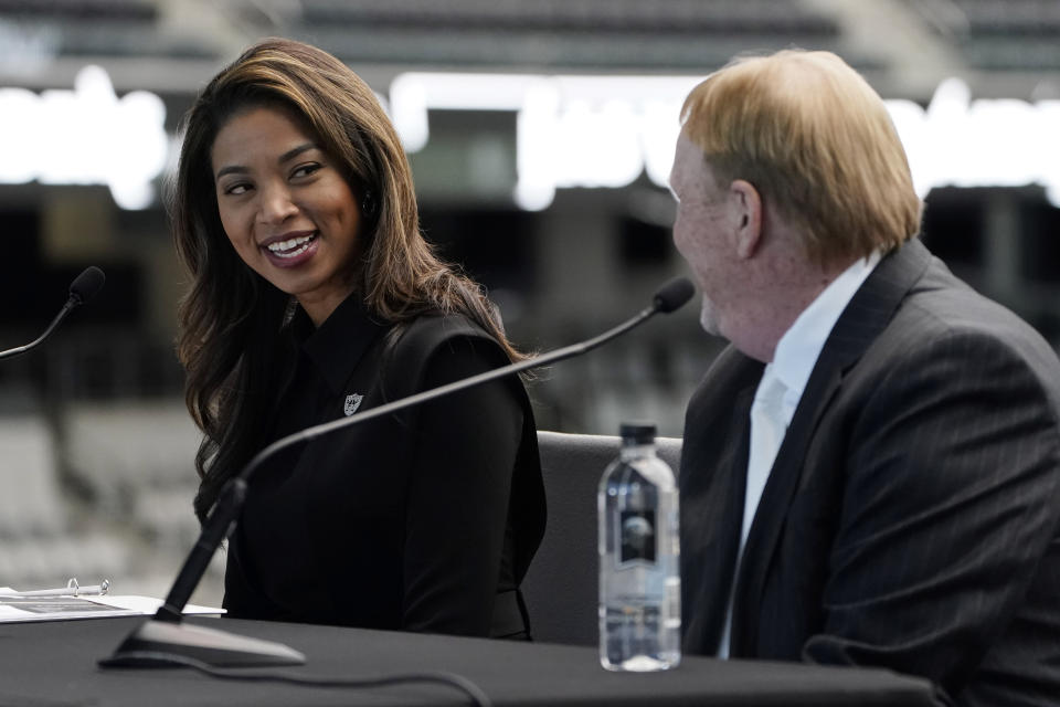 Sandra Douglass Morgan, left, speaks beside Las Vegas Raiders owner Mark Davis during a news conference announcing Morgan as the new president of the Raiders NFL football team Thursday, July 7, 2022, in Las Vegas. (AP Photo/John Locher)