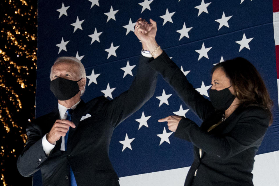 Democratic presidential candidate former Vice President Joe Biden and his running mate Sen. Kamala Harris, D-Calif., watch fireworks during the fourth day of the Democratic National Convention, Thursday, Aug. 20, 2020, at the Chase Center in Wilmington, Del. (AP Photo/Andrew Harnik)