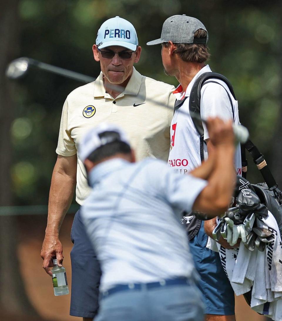 Former NFL head coach Ron Rivera, center, watches a member of his team along the 10th fairway during the Wells Fargo Championship Pro-Am at Quail Hollow Club on Wednesday, May 8, 2024. JEFF SINER/jsiner@charlotteobserver.com