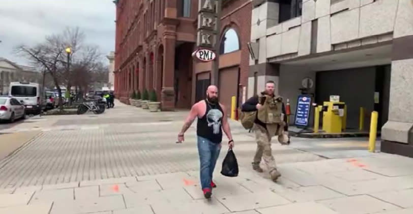 Johsua Pruitt and an associate dressed in tactical gear head downtown to meet up with other members of their Proud Boys chapter at the rally on Jan. 6, 2021. (U.S. District Court for D.C.)