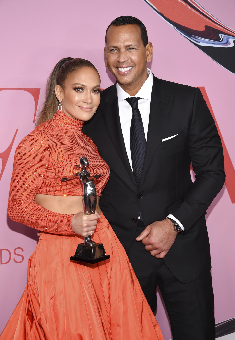 FILE - In this Monday, June 3, 2019, file photo, fashion icon award honoree Jennifer Lopez, left, poses with her fiancé Alex Rodriguez at the CFDA Fashion Awards at the Brooklyn Museum, in New York. Multiple reports based on anonymous sources say Lopez and Rodriguez called off their two-year engagement. The former New York Yankees shortstop proposed to the actor a couple years ago after the celebrity couple started dating in early 2017. (Photo by Evan Agostini/Invision/AP, File)