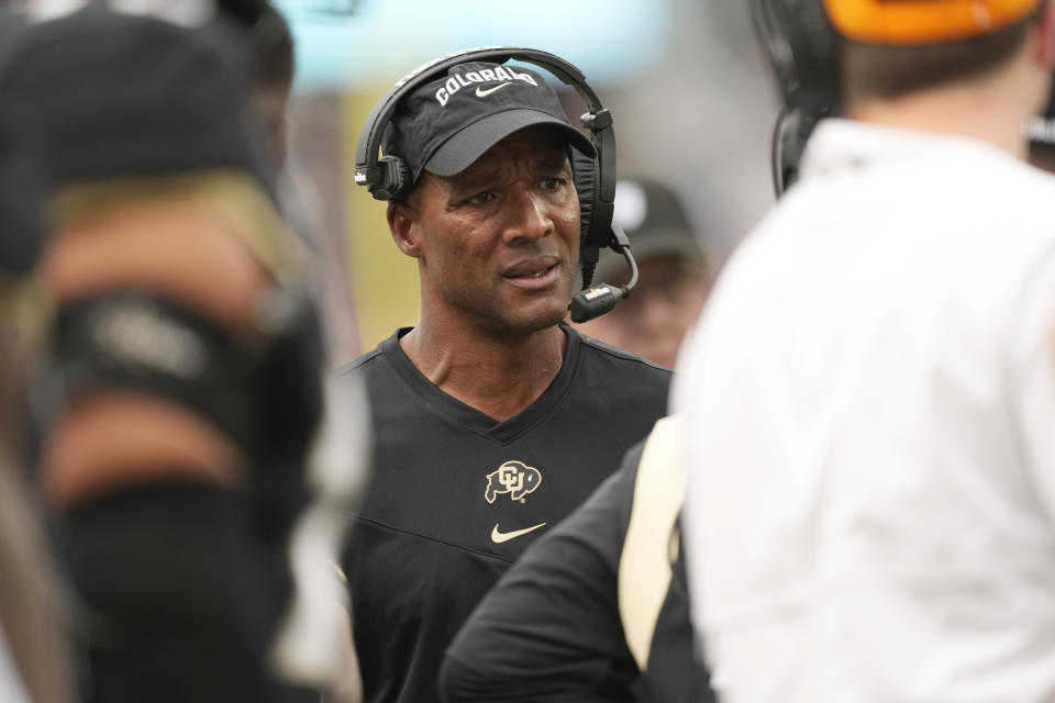 Colorado head coach Karl Dorrell directs his players in the second half of an NCAA college football game against Texas A&M Saturday, Sept. 11, 2021, in Denver. Texas A&M won 10-7. (AP Photo/David Zalubowski)