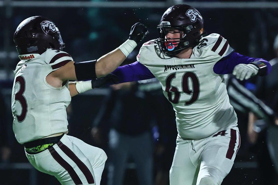 Appoquinimink linebacker Tyler Schaen (3) and defensive linemen Layton von Brandt (69) celebrate a sack during a regular season game between Appoquinimink and Middletown Friday, Nov. 10, 2023, at Cavalier Stadium, in Middletown, DE.