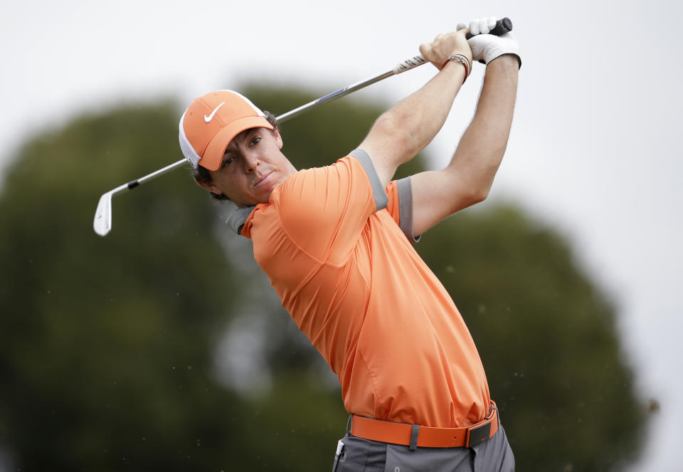 Rory McIlroy of Northern Ireland tees off on the fifth hole during the first round of the Honda Classic golf tournament, Thursday, Feb. 27, 2014, in Palm Beach Gardens, Fla. (AP Photo/Lynne Sladky)