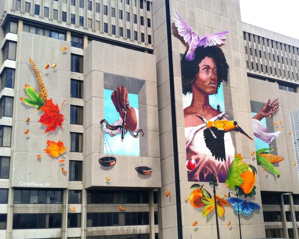 "Spreading the seeds for an equal future," by artist Carlos Alberto GH, located on the back of downtown Detroit's Frank Murphy Hall of Justice.