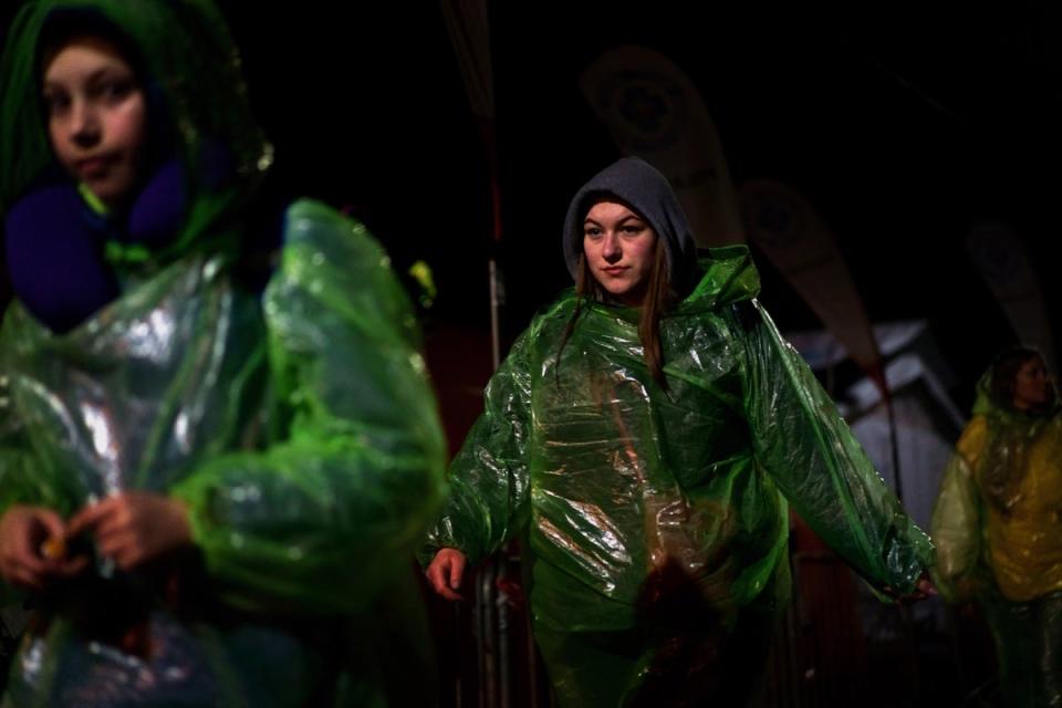 Ukrainian refugees cross the border point from Ukraine into Medyka, Poland in March (Victoria Jones/PA) (PA Wire)