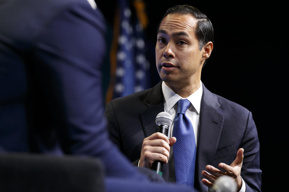 Former Housing and Urban Development Secretary and Democratic presidential candidate Julian Castro speaks with the hosts of "Pod Save the World," at the J Street National Conference, Monday, Oct. 28, 2019, in Washington. (AP Photo/Jacquelyn Martin)