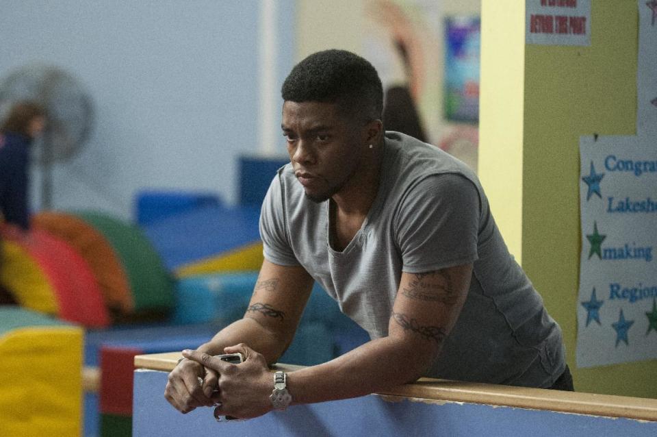 This image released by Summit Entertainment shows Chadwick Boseman in a scene from "Draft Day." (AP Photo/Summit Entertainment, Dale Robinette)