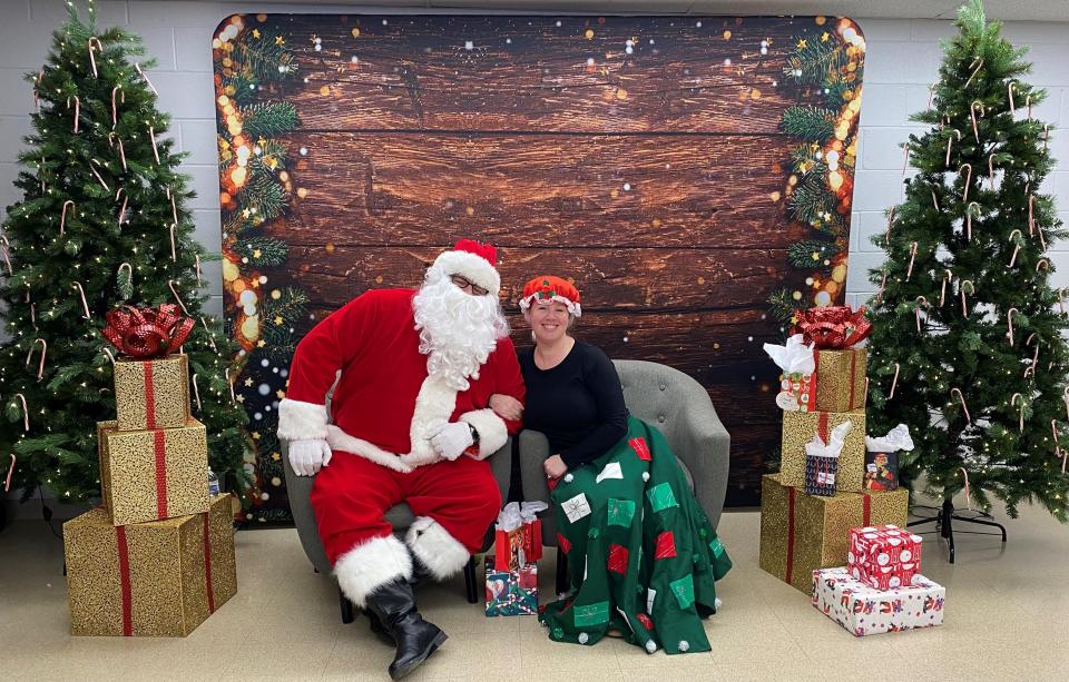 Santa and Mrs. Claus pose together during Fostering Hope Together's annual Breakfast with Santa event, held Dec. 18.