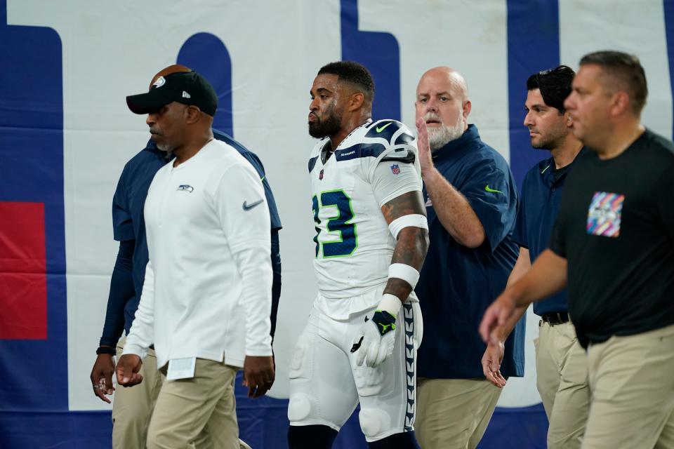 Seattle Seahawks safety Jamal Adams walks off the field on Monday night.