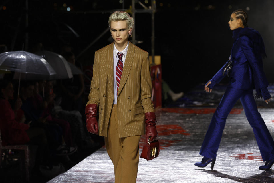 The Tommy Hilfiger Fall 2022 collection is modeled during Fashion Week, Sunday, Sept. 11, 2022, in New York. (AP Photo/Jason DeCrow)