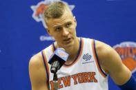 Sep 24, 2018; New York Knicks forward/center Kristaps Porzingis (6) addresses the media at Knicks Media Day, Greenburgh, NY, USA; [CAPTION] at MSG training facility. Mandatory Credit: Wendell Cruz-USA TODAY Sports