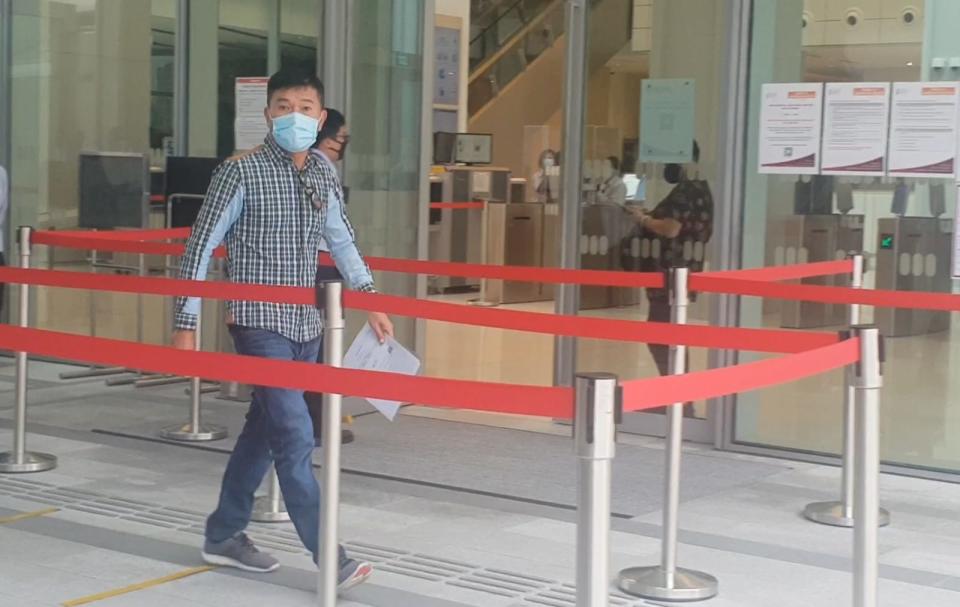 George Heng Seng Huat seen leaving the State Courts on 22 May 2020. (Photo: Yahoo News Singapore)
