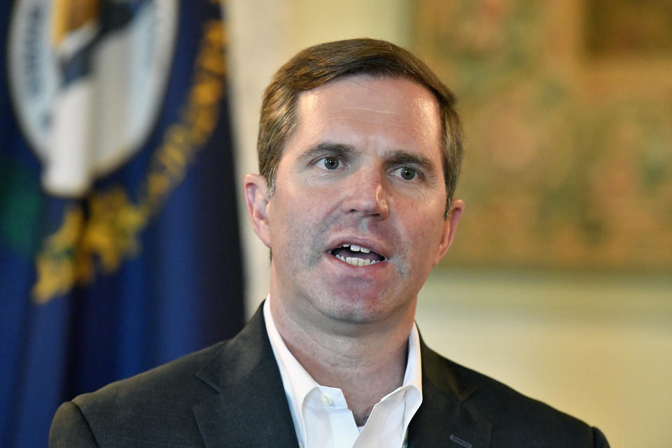 Kentucky Governor Andy Beshear responds to a question during an interview in Frankfort, Ky., Tuesday, Dec. 19, 2023. (AP Photo/Timothy D. Easley)