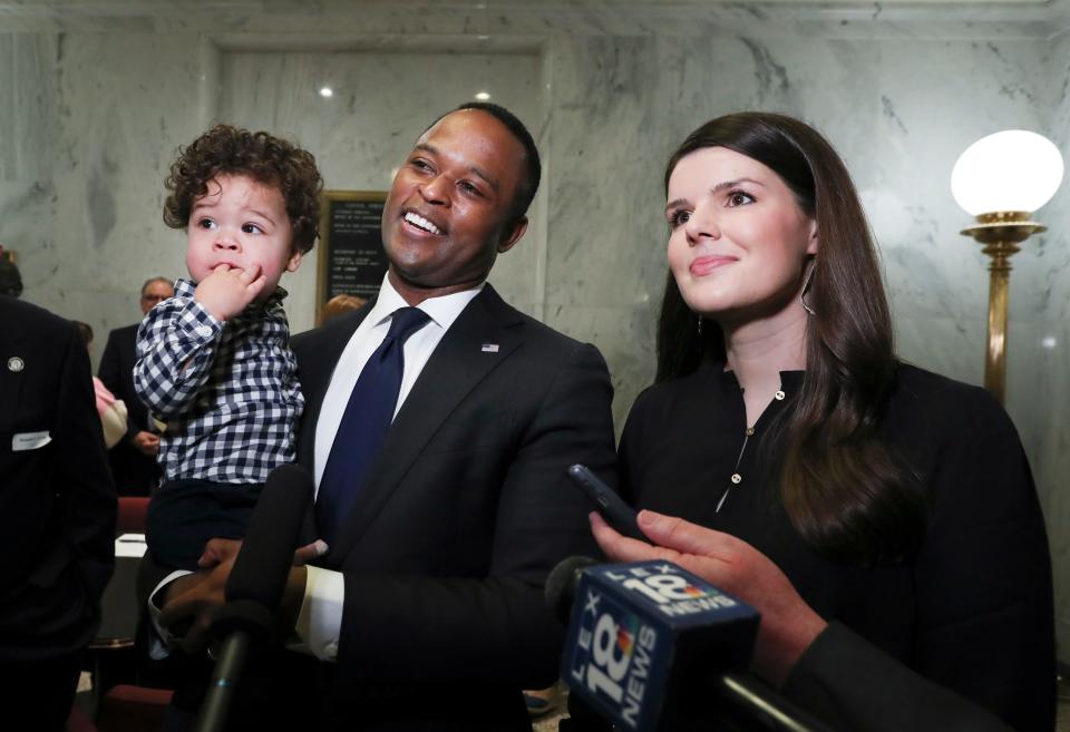 Kentucky Attorney General Daniel Cameron, center, was joined by his wife Makenze Cameron and their son Theodore (1) as he spoke to the media after he signed papers to officially enter the race for governor at the State Capitol Building in Frankfort, Ky. on Jan. 3, 2023.  