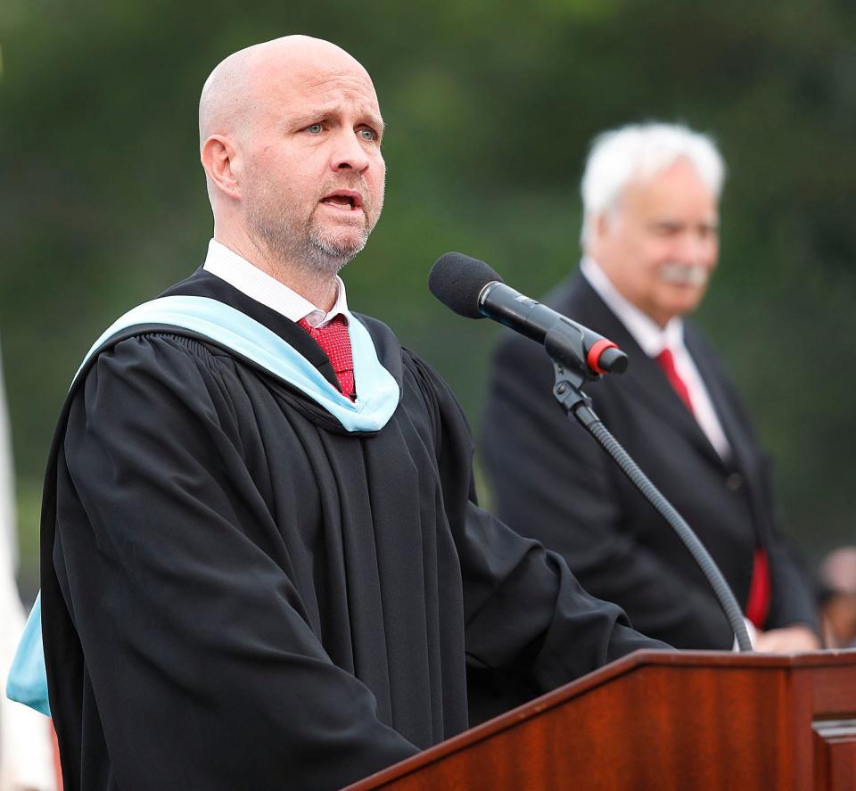 North Quincy High School Principal Daniel Gilbert thanks students and parents for making his first year as principal a memorable one during the school's commencement ceremony at Veterans Memorial Stadium on Tuesday, June 6, 2023.