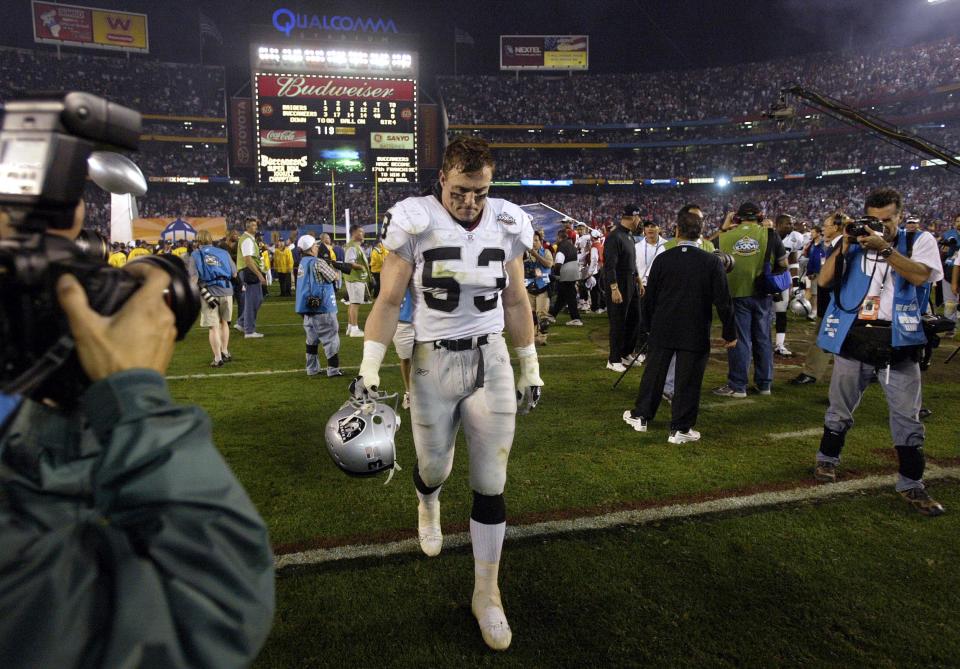 Bill Romanowski leaves the field after the Oakland Raiders lost to the Tampa Bay Buccaneers 48-21 at the Super Bowl 37.