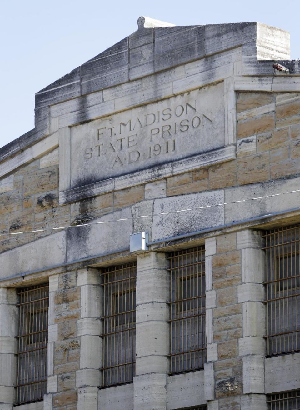 This Monday, Nov. 18, 2013, photo shows the outside of a cell block at the Iowa State Penitentiary, in Fort Madison, Iowa. The penitentiary, the oldest in use west of the Mississippi River with a history dating back to 1839, is set to close when a $130 million replacement opens down the road next year. (AP Photo/Charlie Neibergall)