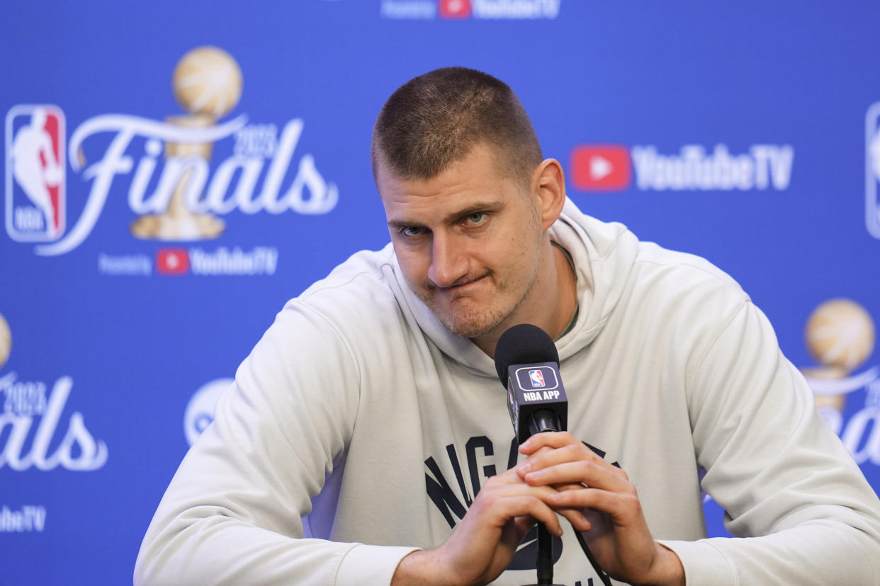 Denver Nuggets center Nikola Jokić speaks during a news conference, Sunday, June 11, 2023, in Denver. The Nuggets take on the Miami Heat in Game 5 of the NBA Finals on Monday. (AP Photo/Jack Dempsey)