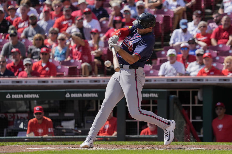 Atlanta Braves' Matt Olson hits a solo home run during the second inning of a baseball game against the Cincinnati Reds, Thursday, Sept. 19, 2024, in Cincinnati. (AP Photo/Joshua A. Bickel)