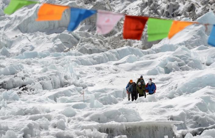 Mount Everest was first ascended in 1953, but the route to the top is still as deadly as ever: eleven people died during the 2019 climbing season (AFP Photo/PRAKASH MATHEMA)