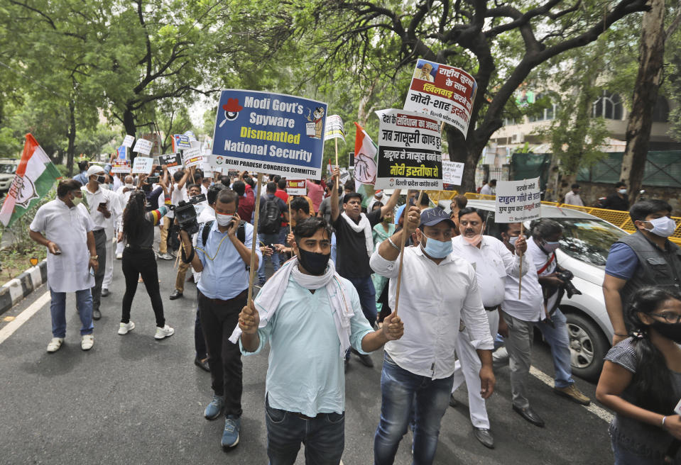 Congress party workers shout slogans during a protest accusing Prime Minister Narendra Modi’s government of using military-grade spyware to monitor political opponents, journalists and activists in New Delhi, India, Tuesday, July 20, 2021. The protests came after an investigation by a global media consortium was published on Sunday. Based on leaked targeting data, the findings provided evidence that the spyware from Israel-based NSO Group, the world’s most infamous hacker-for-hire company, was used to allegedly infiltrate devices belonging to a range of targets, including journalists, activists and political opponents in 50 countries. (AP Photo/Manish Swarup)