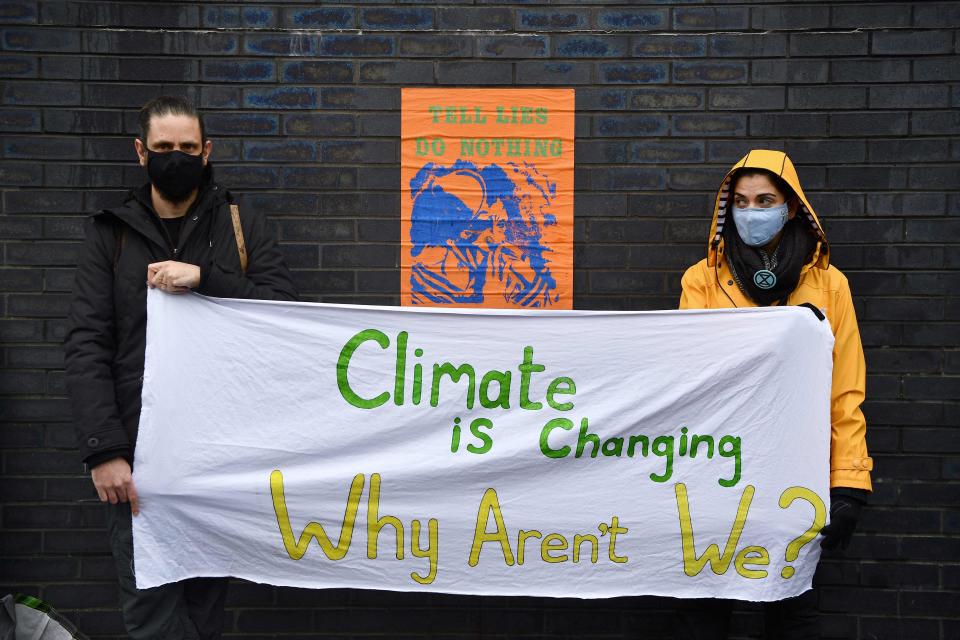 Climate activists participate in a protest action in Glasgow on Nov. 12 during the COP26 UN Climate Change Conference.