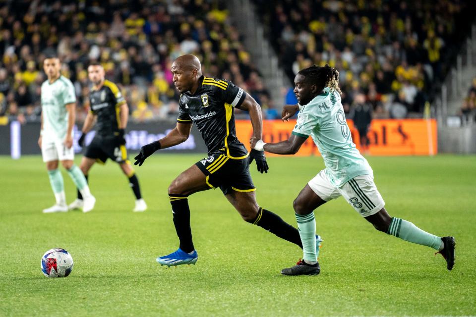 Nov 12, 2023; Columbus, Ohio, USA;
Columbus Crew midfielder Darlington Nagbe (6) runs the ball down the field past Atlanta United midfielder Tristan Muyumba (8) and scores their first goal during game three of their series on Sunday, Nov. 12, 2023 at Lower.com Field.