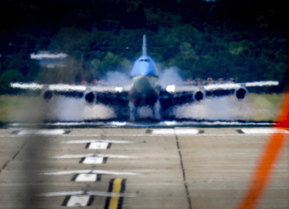 Air Force One with US President Joe Biden lands at the airport in Geneva, Switzerland Tuesday, June 15, 2021. US President Joe Biden and Russia President Vladimir Putin will meet for talks in Geneva on Wednesday. (AP Photo/Michael Probst)