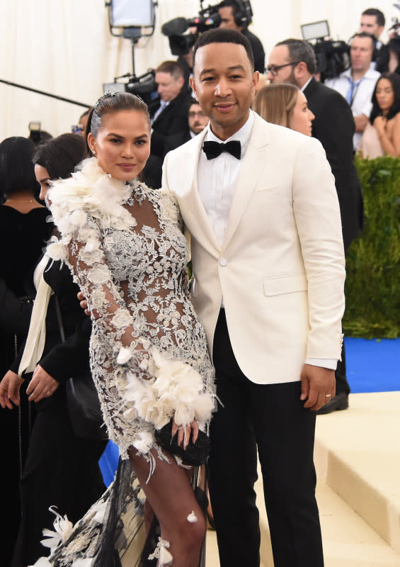 Chrissy Teigen and John Legend attend the 'Rei Kawakubo/Comme des Garcons: Art Of The In-Between' Costume Institute Gala at Metropolitan Museum of Art on May 1, 2017, in New York City.<p>Nicholas Hunt/Getty Images for Huffington Post</p>