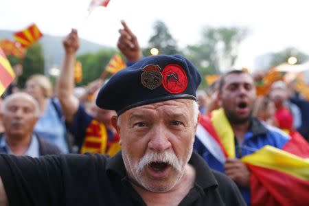 Protesters demonstrate in front of the EU Info Center building in Skopje, Macedonia, April 28, 2017. REUTERS/Ognen Teofilovski