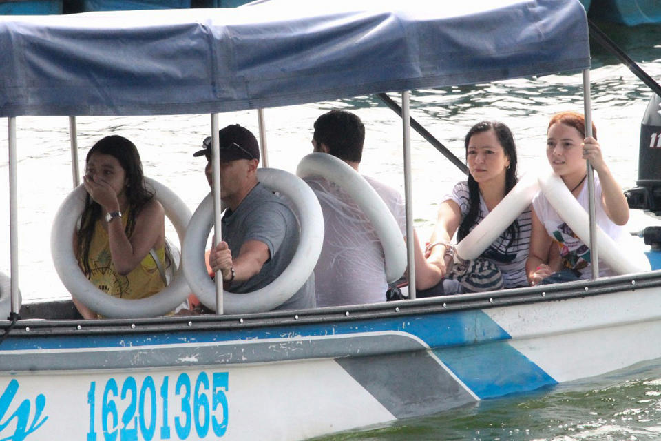 <p>Survivors react after being rescued from the tourist boat Almirante in the Reservoir of Penol in Guatape municipality in Antioquia on June 25, 2017. (Juan Quiroz/AFP/Getty Images) </p>