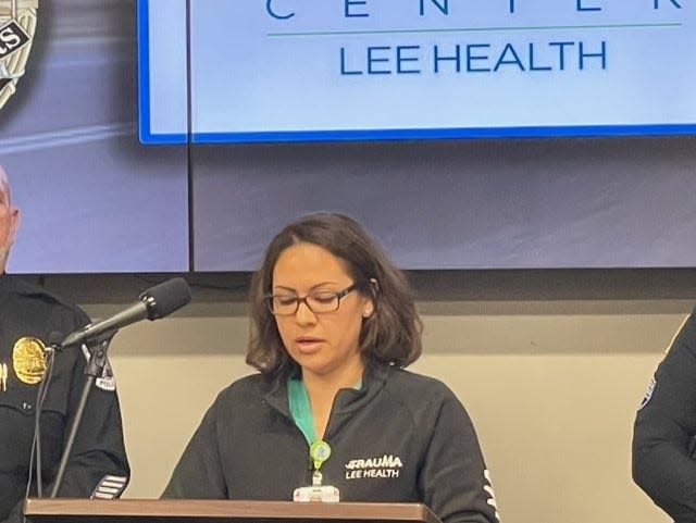 Dr. Maria Alfaro, of Lee Health, addresses the impact of distracted and drunk driving at local hospitals during a Dec. 1, 2022, press conference at the Fort Myers Police Department headquarters.